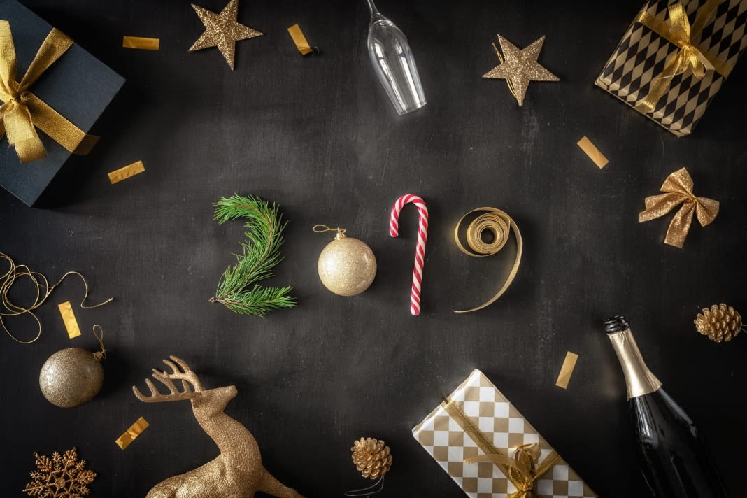 Baubles and gifts on a black desk