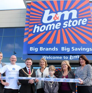 Our Edge Lane Store being opened by lord mayor Tony Concepcion and a representative from local charity Tom Harrison House who received £250 worth of B&M vouchers.