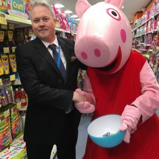 Peppa Pig poses at the opening of the new B&M Bicester store.