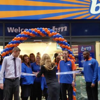 The Mayor of Bromley, Councillor Kim Botting, cutting the ribbon on the new Orpington store.