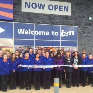 The store being opened by Lord Provost Anne Hall & representatives from Erskine Proud to Care Charity who gratefully accepted £250 of B&M vouchers.