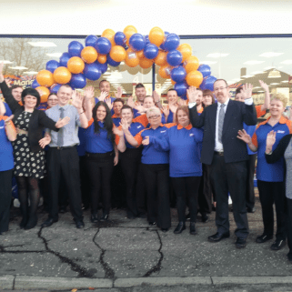 Store staff pose outside their new B&M Bargains Store in Grangemouth.