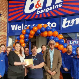 Representatives of The Butterwick Hospice Charity gratefully receiving £250 worth of B&M vouchers.