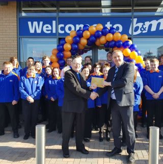 Representatives from Hope4 gratefully accepting £250 worth of B&M vouchers as a thank you for taking part in the store opening