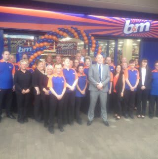 The B&M Kirkby team pose in front of their new and refurbished store at St Chads Parade (former Co-op)
