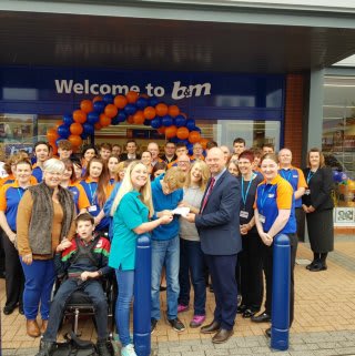 Local charity Dynamic were B&M Wrexham's special guests for their opening day event. They received £250 worth of B&M vouchers as a thank you for taking part.