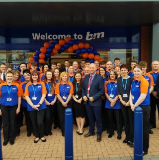 B&M Wrexham's store team pose outside their new home at Central Retail Park.