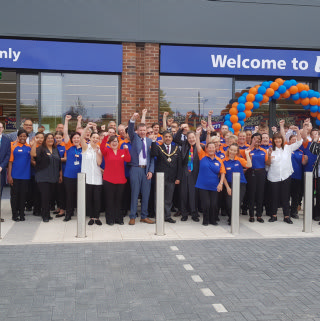 B&M Clifton's store team celebrate the opening of their brand new store on Green Lane.