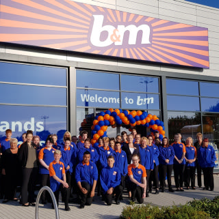 Staff at B&M's latest store in Telford celebrate opening their doors to their very first customers.