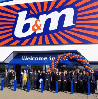 Store staff at B&M's Willenhall store celebrate the re-opening of their store at Keyway Retail Park, after refurbishment works.