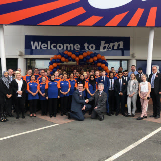 B&M's store team celebrate the opening of their brand new store, following a relocation at St Andrew's Retail Park, Small Heath.