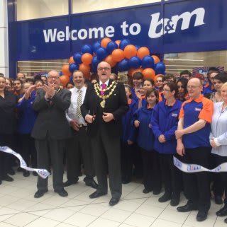 Councillor Mike Connolly was B&M's special guest at the Bury relocation and reopening, cutting the ribbon to officially open the Mill Gate Shopping Centre store.