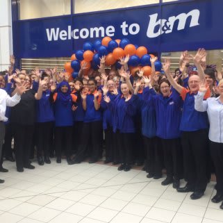 B&M Bury's store team pose outside their brand new store at Mill Gate Shopping Centre, following relocation from Angouleme Retail Park.