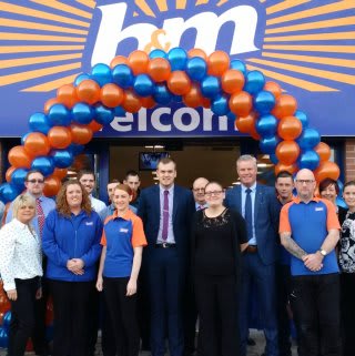 B&M Newtownards store team pose in front of the relocated Bargains Store.
