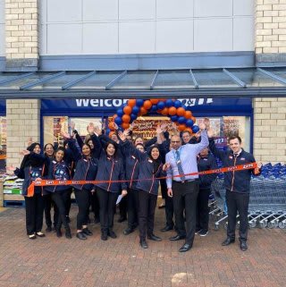 The store team at B&M's newest store in Bradford pose in front of their wonderful new Home Store & Garden Centre, located at Victoria Shopping Centre.