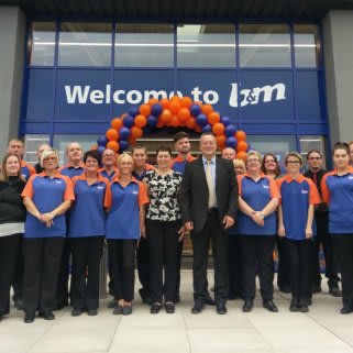 The store team pose in front of their recently refurbished B&M store in Belper.