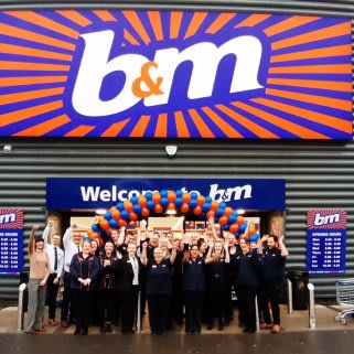 The store team at B&M's newly refurbished store in Derby pose in front of their wonderful new Home Store, located on Ascot Drive.