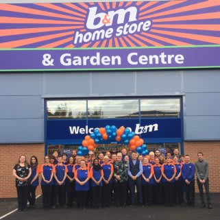 B&M Chadderton's store team pose outside their brand new store at Gateway Retail Park.