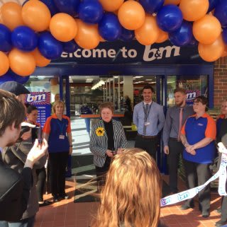 Libby Kendrick of Lindsay Lodge Hospice cut the ribbon at the opening ceremony. B&M Brigg store manager James Smith presented Mrs Kendrick with £250 worth of vouchers, as a thank you for opening the store.
