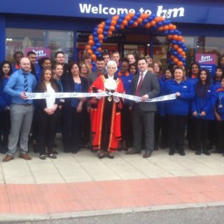 Store manager Ben Gough is joined by Mayor of Hillingdon Catherine Dann who cut the ribbon with local charity Micheal Sobell Hospice.