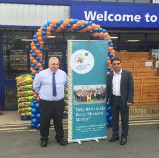 Representatives from John Taylor Hospice were B&M's special VIPs for the day, cutting the ribbon for the new store in Minworth