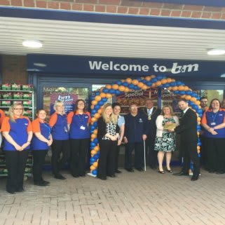 Representatives of Hull and East Yorkshire Royal Institute for the Blind is joined by Councillor Peter Turner who officially opened the new Willerby store.