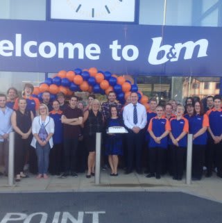 B&M Stowmarket store team pose in front of their brand new Bargains store on Milton Road South.