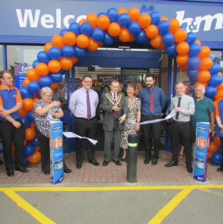 B&M Bridgwater being formally opened by representatives from the Brainwaves charity who also gratefully received £250 worth of B&M vouchers.
