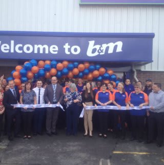 B&M Pembroke Dock being officially opened by the Mayor of Pembroke, Councillor Maureen Colgan, and Liz, a representative of Pennar Community Hall.