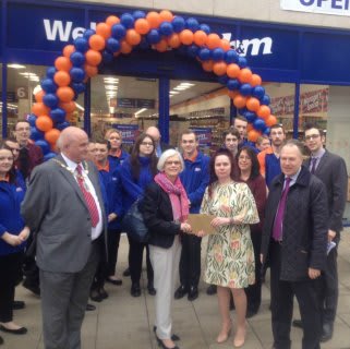 Representatives from Peterborough Soup Kitchen gratefully accepting £250 worth of B&M vouchers, as a thank you for opening the new B&M Peterborough.