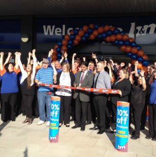 B&M's special guests, local charity Headway South Stafforshire cut the ribbon to officially declare the new B&M Kingsmead store 'open'.