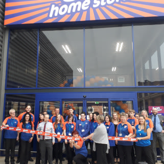 B&M's store team cut the ribbon on opening day, welcoming their first customers on Westlode Street, Spalding.