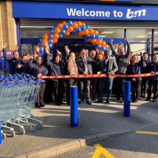 B&M store staff at Kirkby-in-Ashfield show their excitement at the official opening of their brand new store in the town.