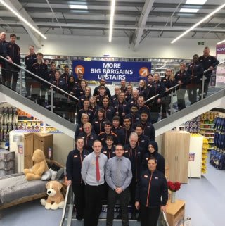 The store team at B&M's newest store in Bingley pose in their wonderful new Home Store & Garden Centre, located on Keighley Road