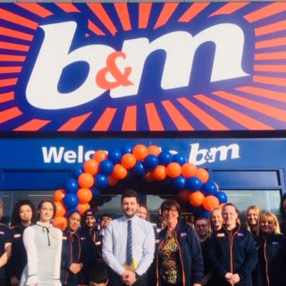 The store team at B&M's newest store in Huddersfield pose in front of their wonderful new B&M Store, located on Leeds Road Retail Park.