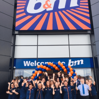 The store team at B&M's newest store in Lichfield pose in front of their wonderful new B&M Store, located on Eastern Avenue.