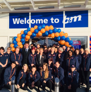 The store team at B&M's newest store in Portsmouth pose in front of their wonderful new B&M Store, located at Ocean Retail Park.
