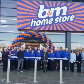 B&M Portlethen being officially opened by Aberdeen footballer Niall McGinn, and Deputy Provost Allison Grant.