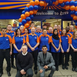 The store team at B&M's new Bishop's Stortford store are all smiles as they open their doors for their first customers.
