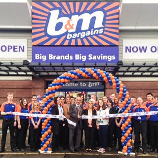 Glasgow Western Road store being opened by the Deputy Lord Provost of Glasgow and a representative of Yorkhill Children's Hospital.