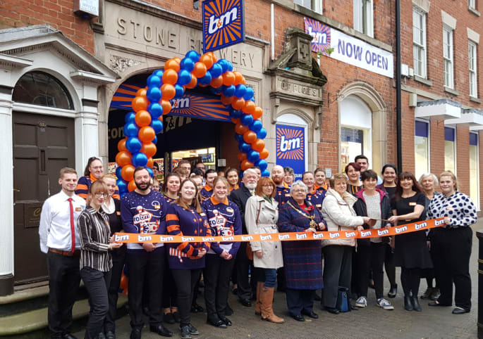 617-stone-store-opening-ribbon
