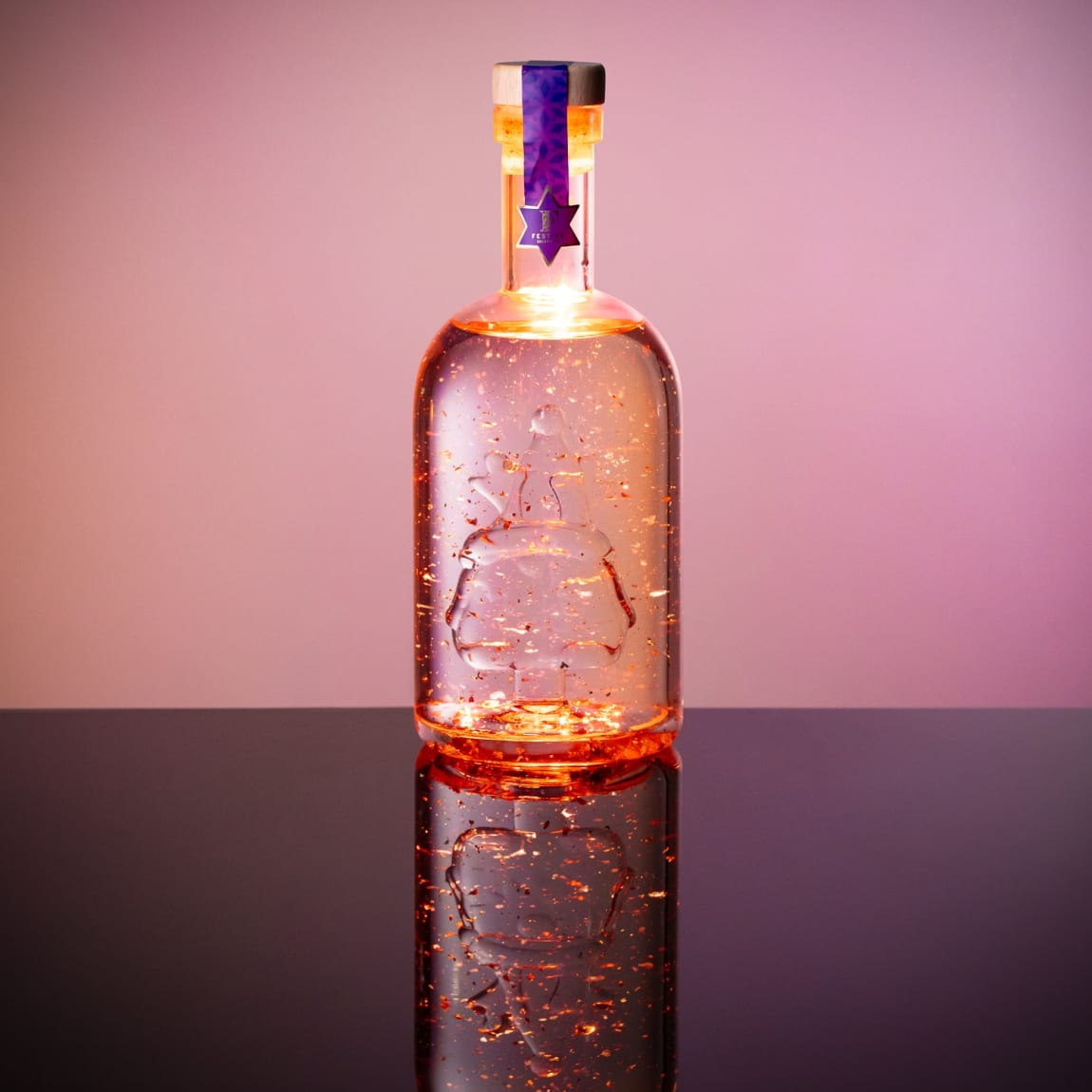 416024-light-up-gonk-gin-liqueur-with-gold-flakes-winter-berries-2