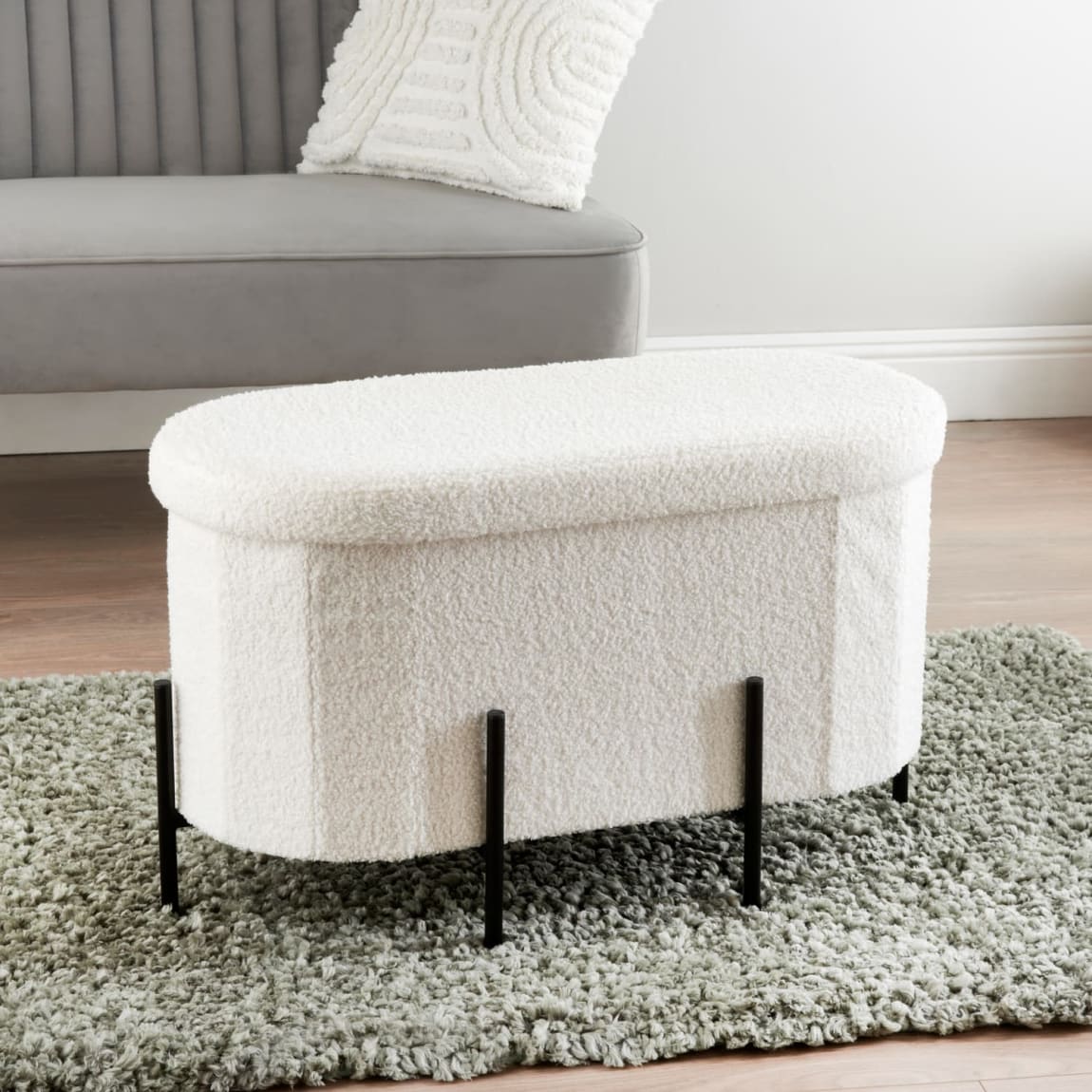 418550-curved-ottoman-with-legs-2