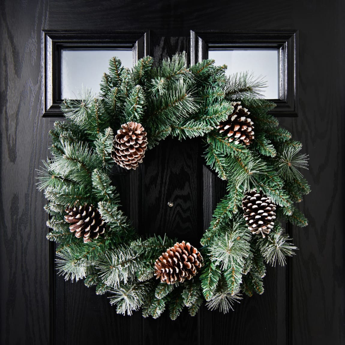 425459-60cm-dusted-wreath-with-pinecones1