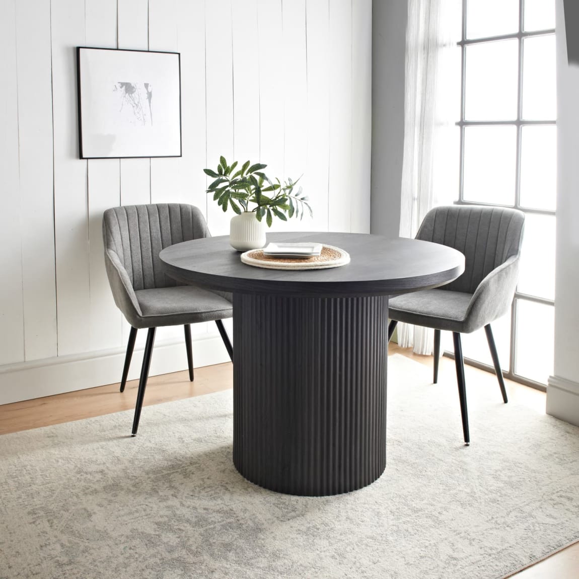 425855-ezra-black-dining-table-with-panelled-base-105cm