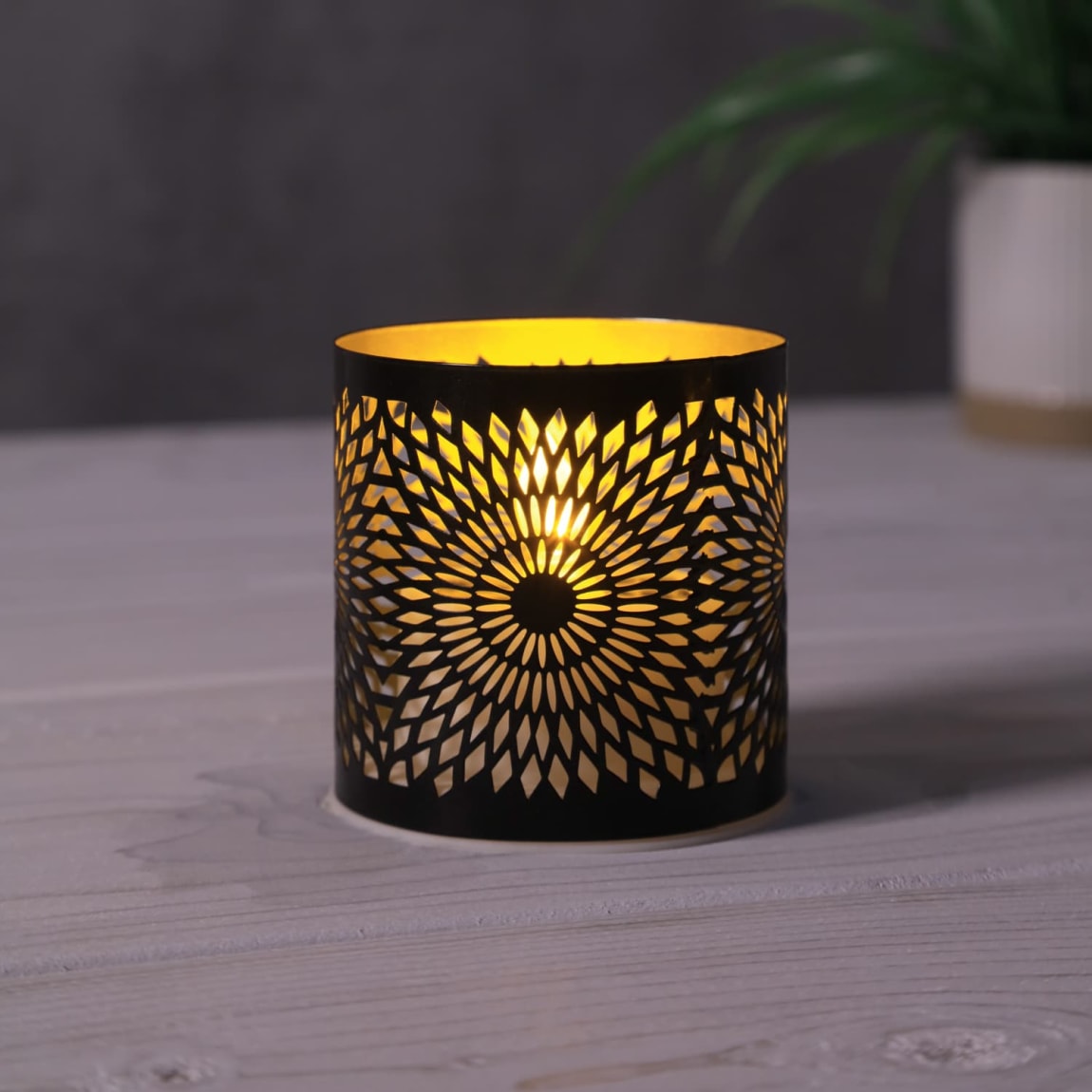 429596-solar-powered-metal-cut-out-tealight-black