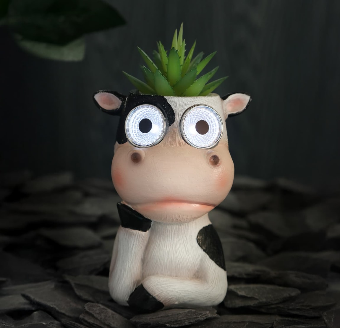 429648-solar-powered-cow-with-artificial-succulent