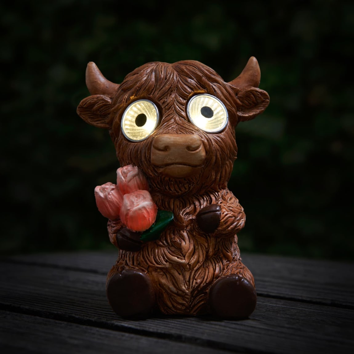 429683-solar-powered-big-eyed-highland-cow-2