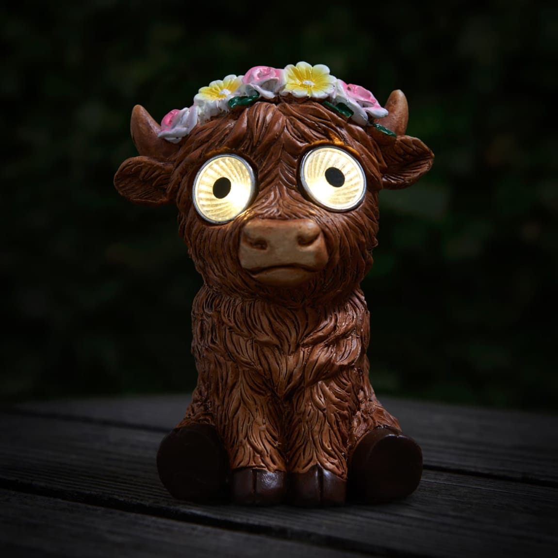 429683-solar-powered-big-eyed-highland-cow-3