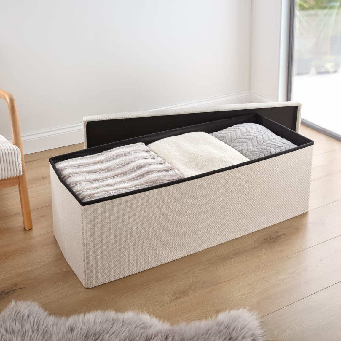 430266-xl-textured-crm-fabric-ottoman-2